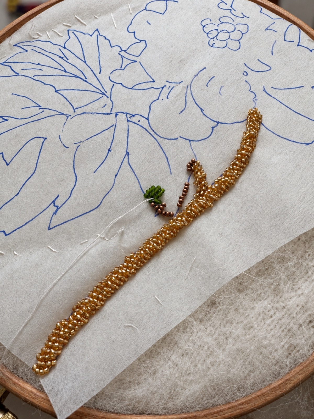 Gold hand beading detail